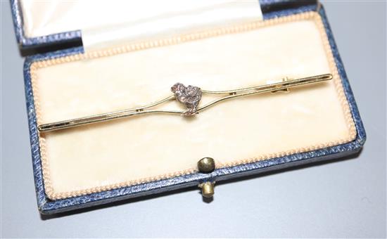 An early 20th century yellow metal and rose cut diamond set chick bar brooch, 65mm, gross 5 grams.